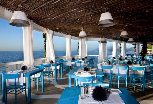The terrace of the restaurant Il Riccio Beach Club in Anacapri with a panoramic view of the Mediterranean sea