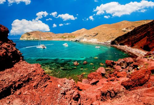 The Red Beach with its red volcanic cliffs and turquoise waters on the island of Santorini in Greece