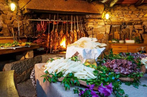 Barbecue, assorted cheeses and cold meats at the Lu Stazzu restaurant on the Costa Smeralda