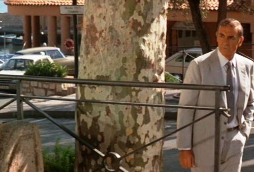 Sean Connery standing by a tree in Villefranche-sur-mer in the  James Bond opus Never say never again