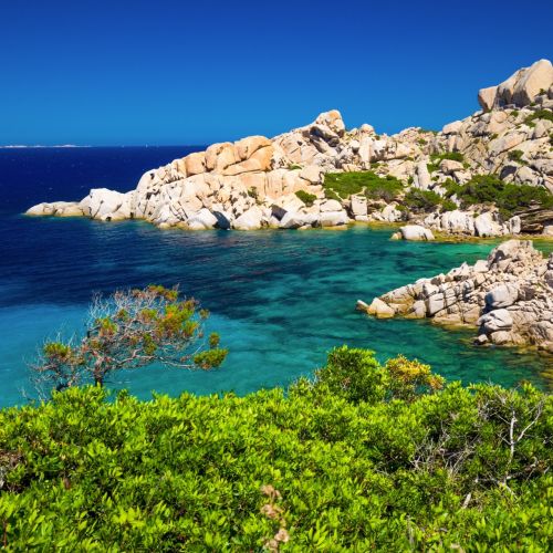 Rock formation and turquoise waters in the archipelago of La Maddalena in Sardinia