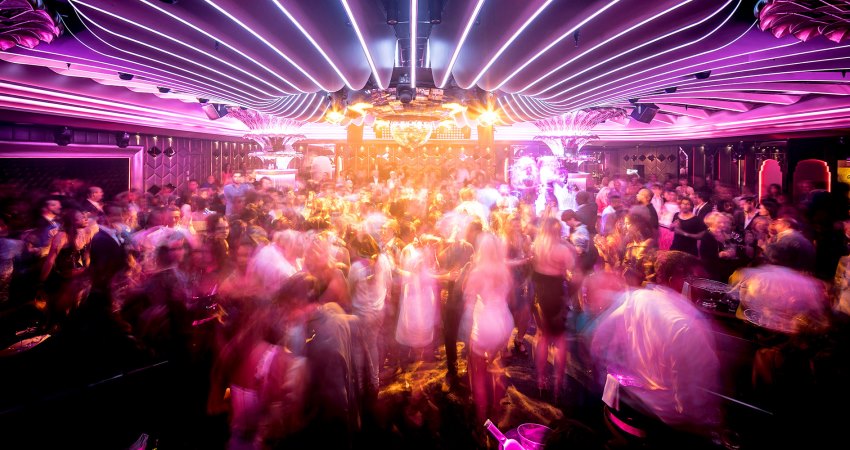 People dancing during a party at Les Caves du Roy in St Tropez