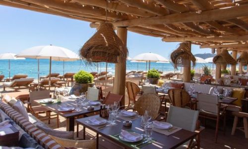 Tables set up for lunch at the restaurant La Rserve  la Plage in Ramatuelle near St Tropez