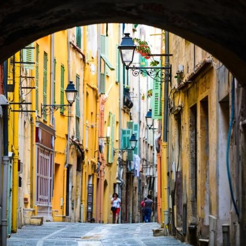 The colourful streets of the old town of Menton on the French Riviera in the Mediterranean