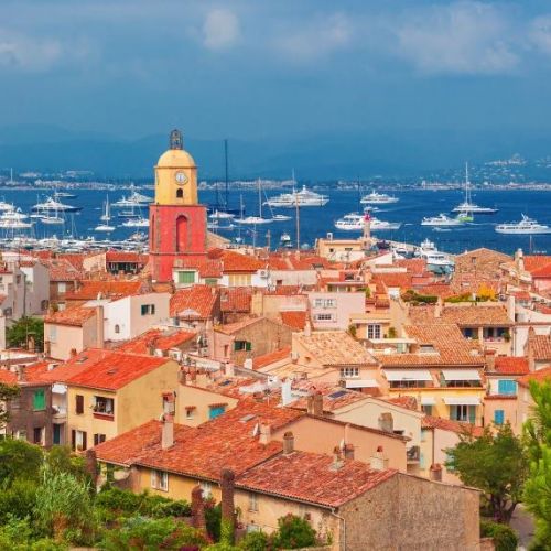 The village of St Tropez and the bay with charter yachts at anchor