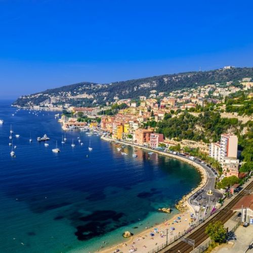 The bay of Villefranche-sur-mer on the French Riviera with a few yachts at anchor