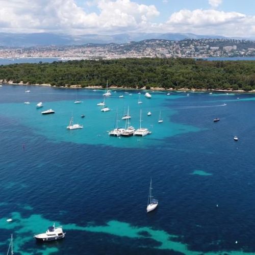 The Lerins Islands in the bay of Cannes with charter yachts at anchor