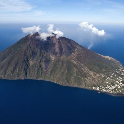 The island of Stromboli and its active volcano in the Aeolian Islands in Sicily