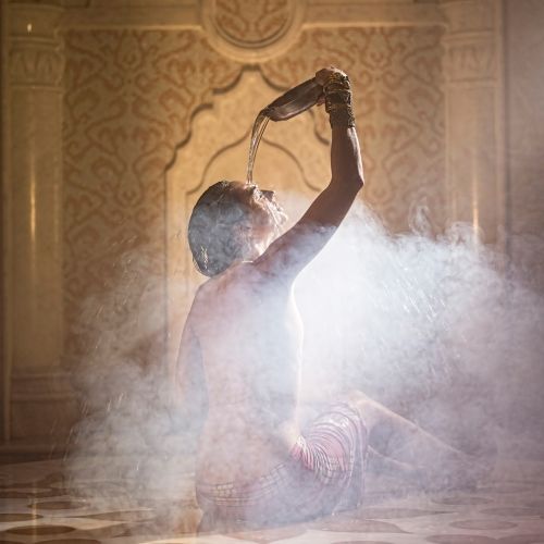 A woman enjoying a relaxing moment in a traditional hammam in Turkey