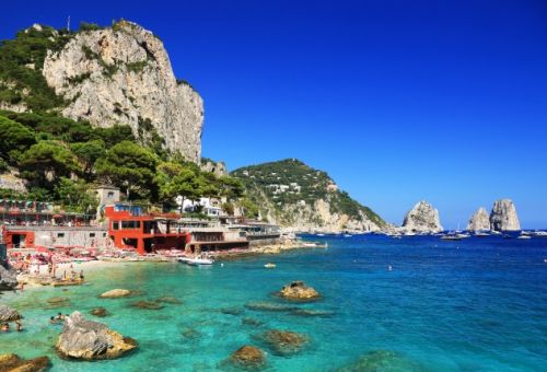 The idyllic Marina Piccola anchorage in Capri, Italy, with yachts at anchor