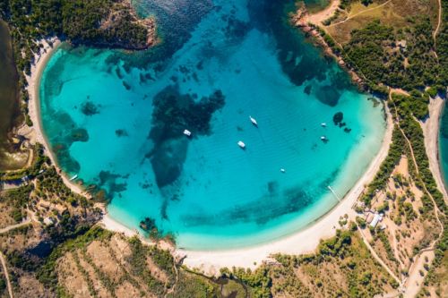 Aerial view of the superb sandy beach of Rondinara with its turquoise waters in Corsica