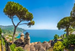 Panoramic view of the village of Ravello with its church, pine trees and the Mediterranean sea