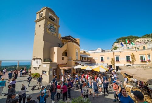 The Piazzeta of Capri on a beautiful summer's day with people on caf terraces