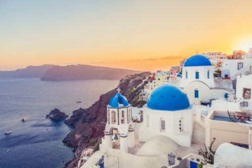 Sunset in Oia on the island of Santorini, one of the best honeymoon destinations in the Mediterranean