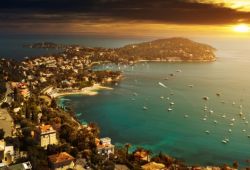 The sun sets on the peninsula of Saint-Jean-Cap-Ferrat in the south of France