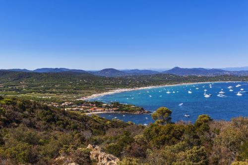 The beach of Pampelonne in Ramatuelle near St Tropez with yachts at anchor