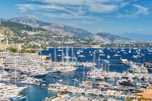 Luxury sales and charter yachts moored in Port Hercule during the Monaco Yacht Show events