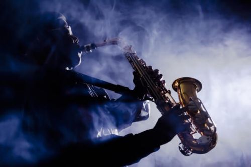 A saxophonist playing during a concert at the Monte-Carlo Jazz Festival