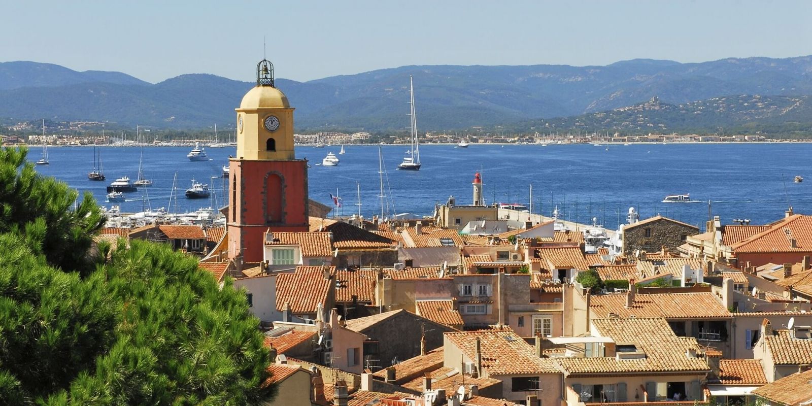 https://www.talamare.com/medias/View of St Tropez village with yachts at anchor