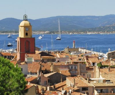 View of St Tropez village with yachts at anchor