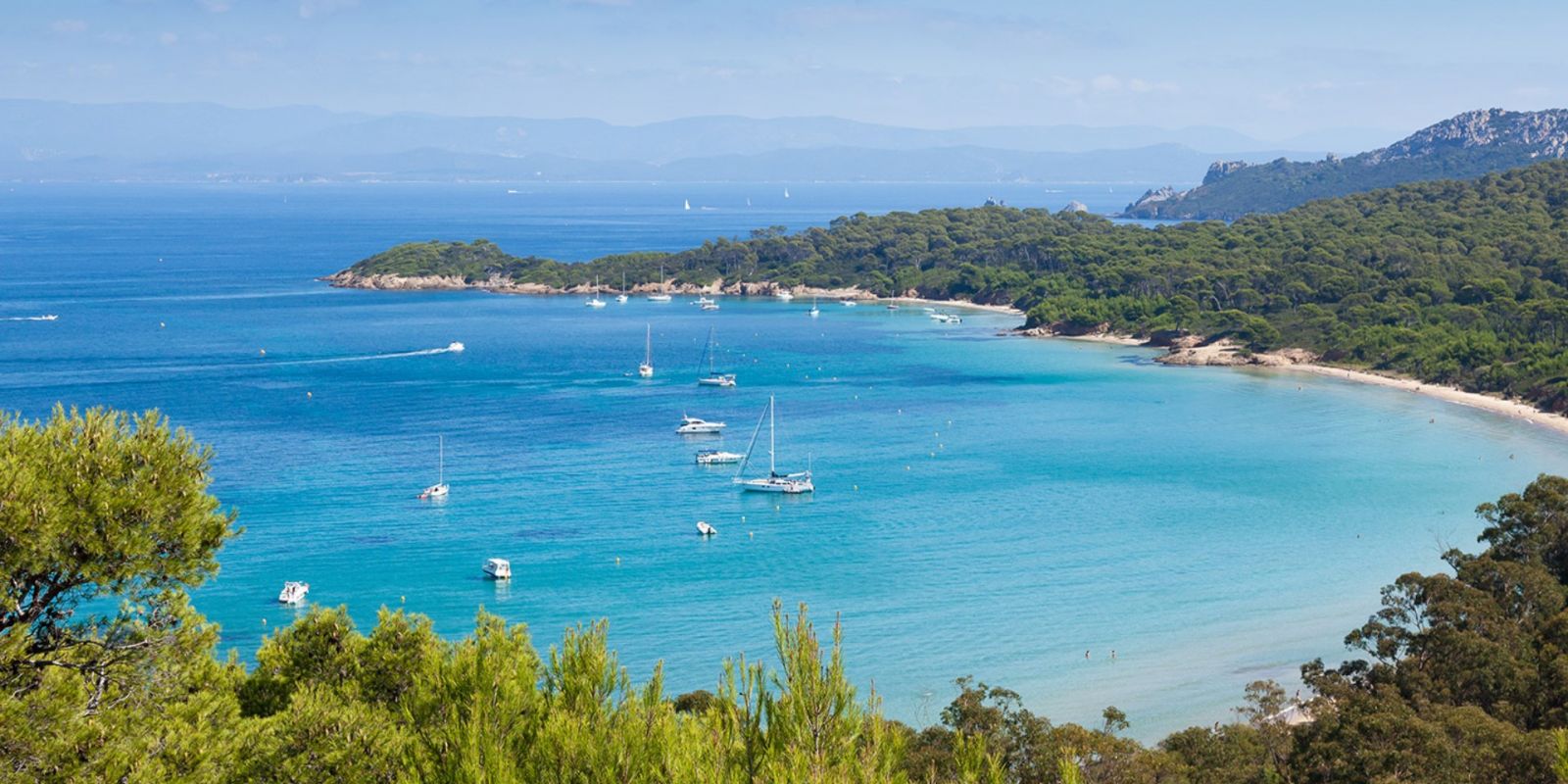 https://www.talamare.com/medias/View of a bay on the island of Porquerolles during a French Riviera yacht charter