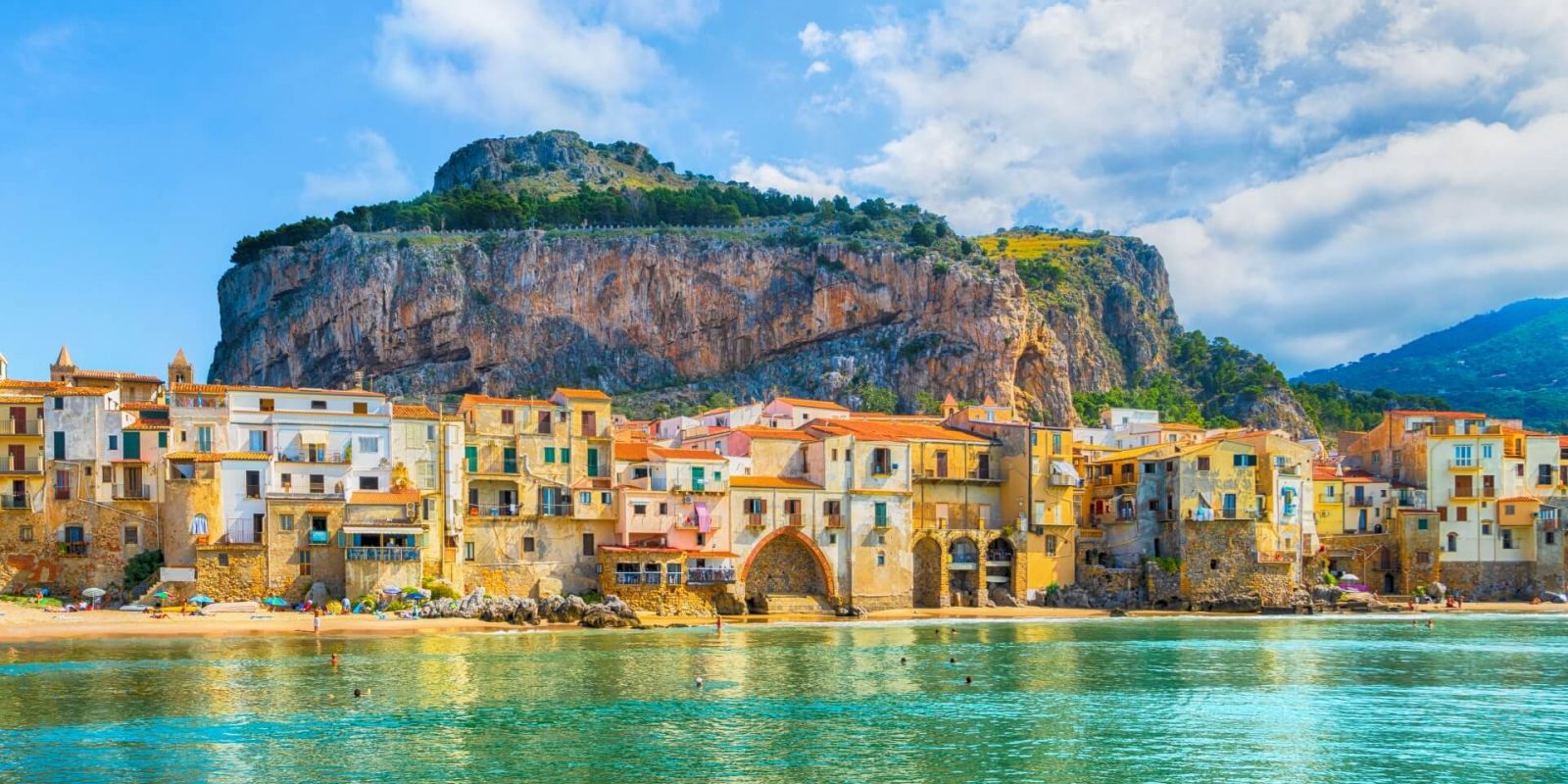 https://www.talamare.com/medias/The medieval village of Cefalu as seen during a Sicily yacht charter