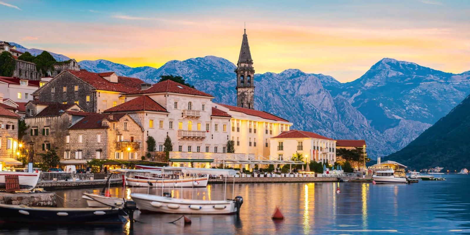 https://www.talamare.com/medias/Sunset over the historic town of Perast in the Bay of Kotor during a Montenegro yacht charter