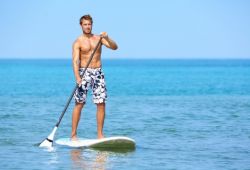 A man on a paddle board