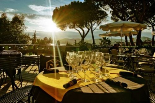 The terrace of the Hotel Ermitage on the heights of St Tropez with a view of the bay