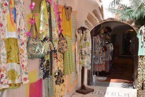 A fashion boutique selling women's clothing on a street in St Tropez