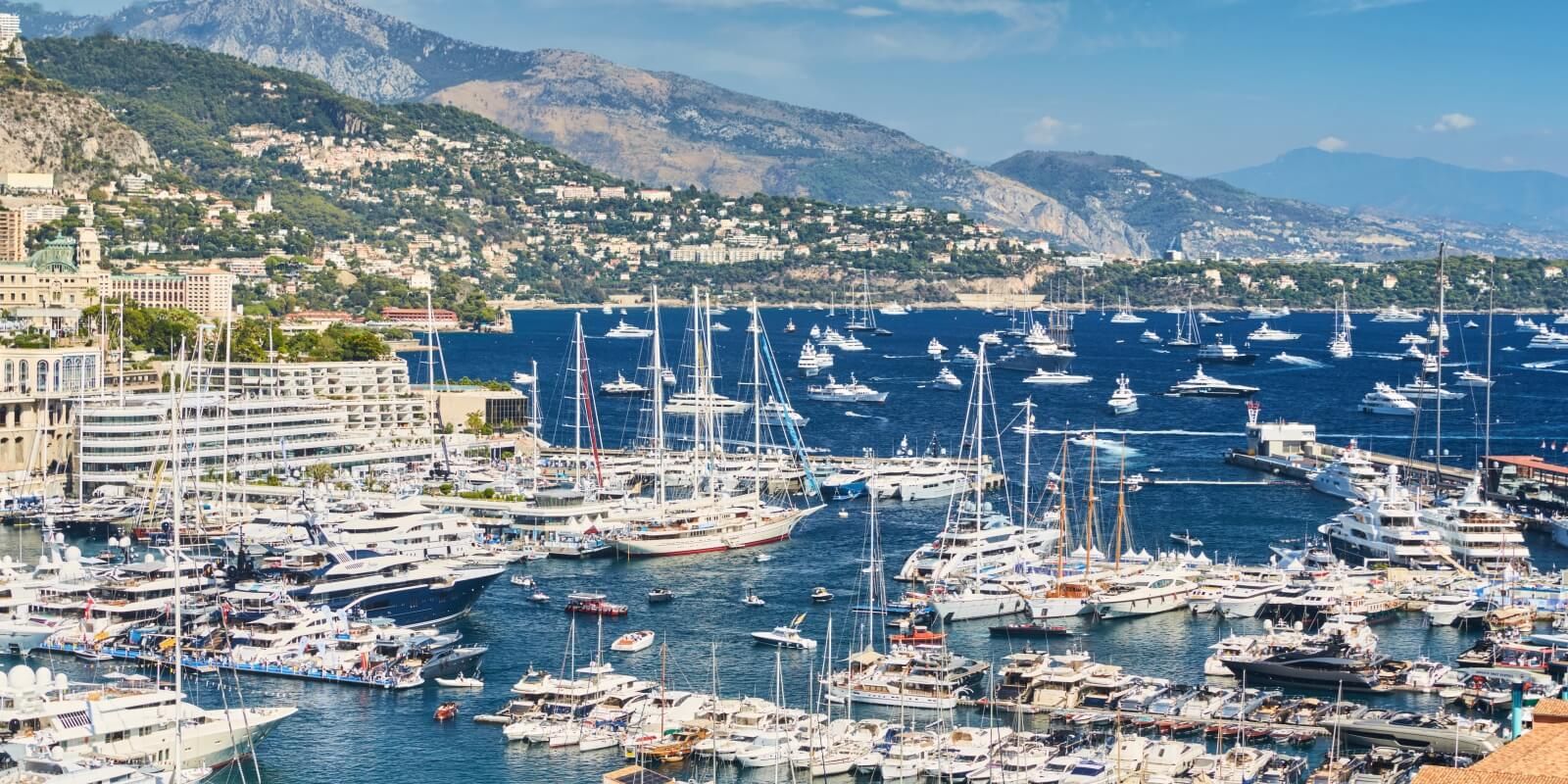 https://www.talamare.com/medias/Port Hercule entrance in Monaco with yachts set up for event yacht charters