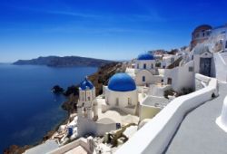 Blue domes and white buildings on the island of Santorini in Greece