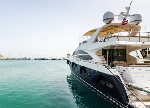 The boarding passerelle of a yacht moored in a port on the French Riviera