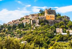 Panoramic view of the hilltop village of Eze under a beautiful blue sky