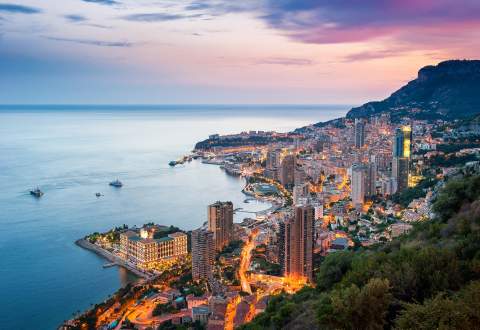 Night view of the Principality of Monaco during a Mediterranean yacht charter